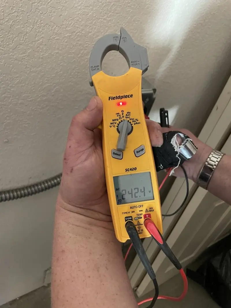 Voltage testing with clamp meter during Circuit Breaker Repair in Roseville